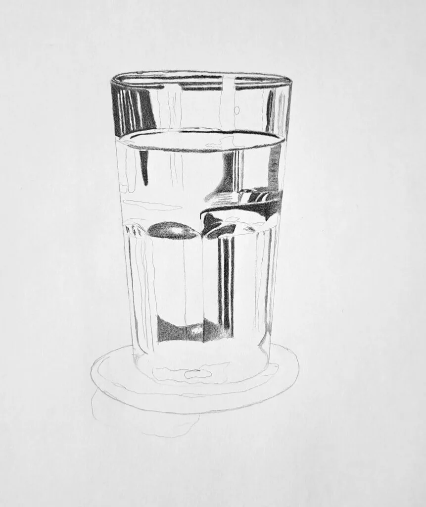 Shade the darkest details of tthe glass with a soft pencil